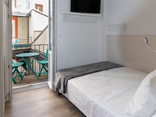Appartement avec balcon et vue cour